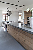 Modern country-house-style kitchen with concrete worksurface