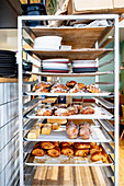 Sweet pastries on a shelf in a bakery