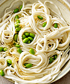 Vegan noodle bowl with edamame beans