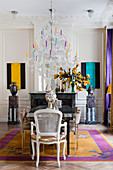 Opulent dining room with brightly coloured accents in period building