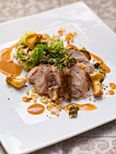 Veal knuckle with savoy cabbage and chanterelle mushrooms