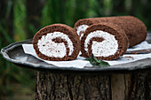 Vegan chocolate Swiss roll with stracciatella cream