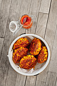 Sweetcorn fritters with carrots and courgettes