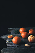 Clementines on a wooden surface