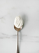 Crème fraîche on a spoon