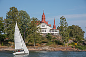 A sailing baot and the restaurant Saaristo on an island, Helsinki, Finland