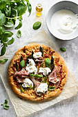 Asparagus pizza with burrata and ham