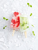 Red berry and cucumber pop sicles