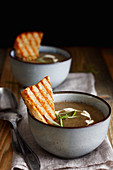 Creamy mushroom soup with toasts