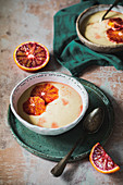 Pudding of millet with red oranges