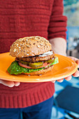 Vegan burger - beyond meat veggie patty, vegan mayo, pickles, grilled onion, lettuce, tomato