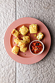Battered feta cheese with salsa