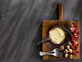Raclette mit Kartoffeln und Schinken