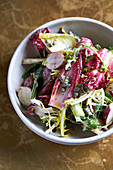 Radish salad with chicory and anchovy dressing