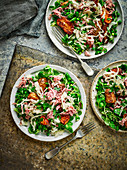 Crispy spud salad with sauerkraut, ham hock and peas