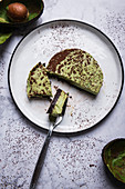 Vegan raw food avocado cake with date and nut base