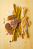 Saffron breadsticks, spice and lentil crackers, potato chips with black cumin