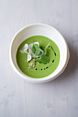 Spinach and coconut soup with grain of paradise chutney