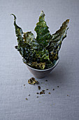 Palm cabbage chips with seaweed and tarragon salt