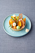 Apricot and pistachio tartlet with rocket