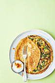 Pancake with chicken, spinach and dried tomatoes
