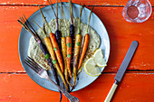 Roasted carrots in a herb sauce
