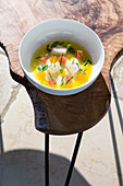 Olive oil soup with scallops and grapefruit