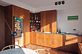 Fitted kitchen with wooden fronts