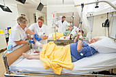 Nurses dressing a wound
