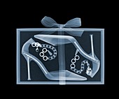 Gift box containing high heeled shoes, X-ray