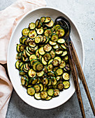 Chopped courgette and garlic served in a bowl