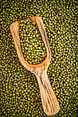 Green mung beans with a scoop