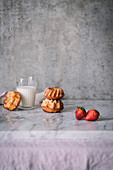 Mini bundt cakes on a marble work surface
