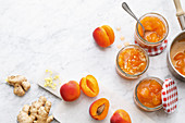 Apricot jam with ginger in screw-top jars