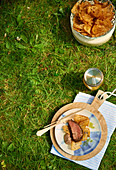Simmental beef fillet with bread chips for a picnic