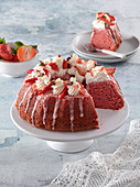 Strawberry cake with whipped cream and icing