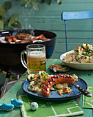 Grilled sausages and potato salad with a yoghurt dressing