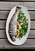 Baked trout with beans
