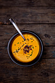 Cream of carrot soup with coconut milk and curry