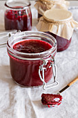 A jar of homemade cherry jam