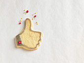 A thumbs-up biscuit