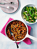 Spicy bean chilli with avocado salad