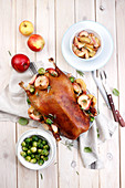 Baked goose with apples and brussels sprout