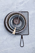 Baking tins, a cooling rack and a pastry brush