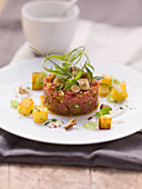 Beef tartare with fried, diced potatoes