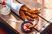 Sweet potato wedges with ketchup