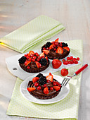 Chocolate and avocado cake with berries