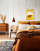 Bedroom in retro style ochre and brown tones