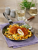 Cordon bleu mit Gruyère auf Zucchini-Kartoffel-Gemüse