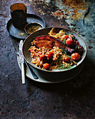 Braised thick-cut bacon with barley, fennel and tomato
